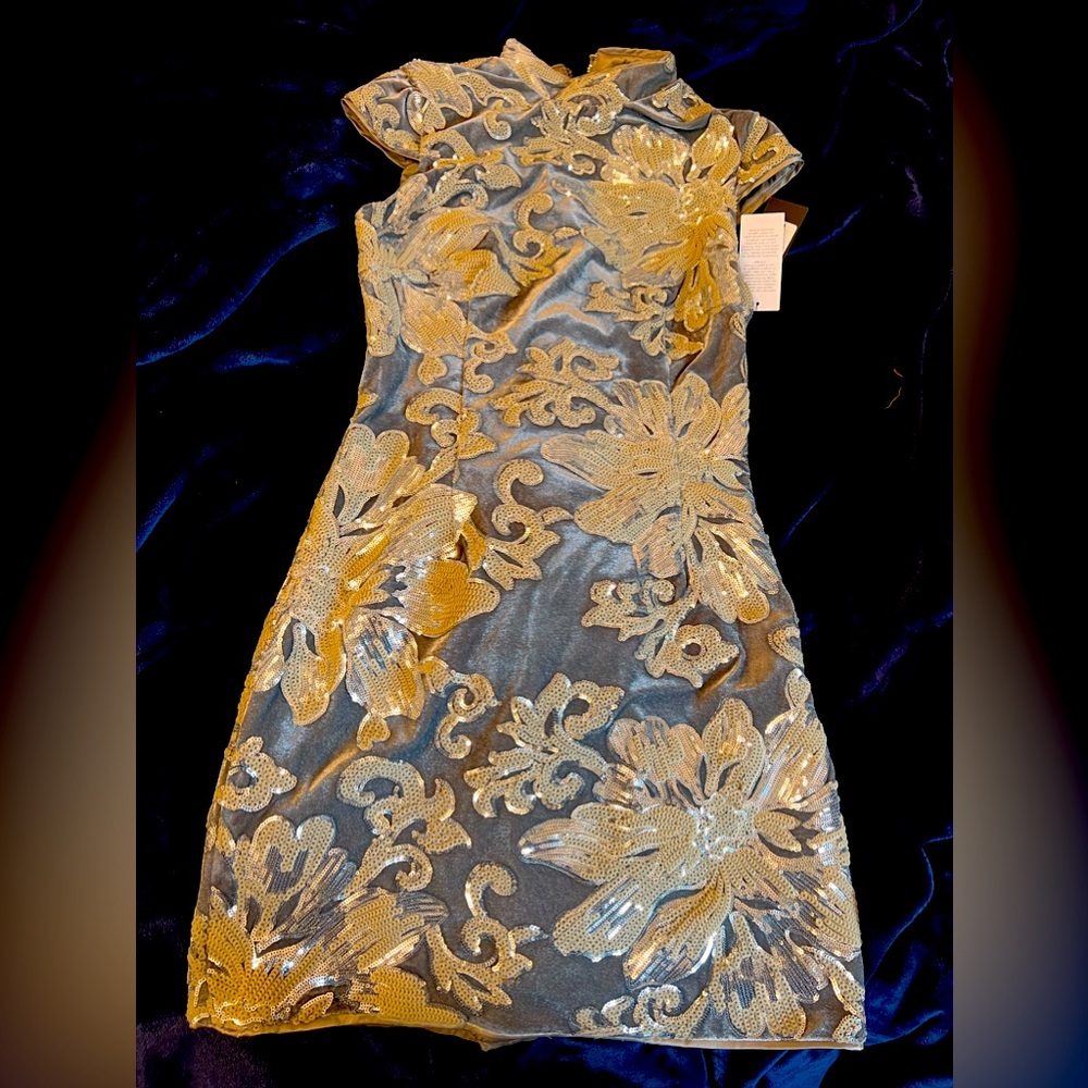 NWT by Guess. Size M. Grey with silver and ivory sequins.